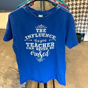 “The influence of a good teacher can never be erased” tee